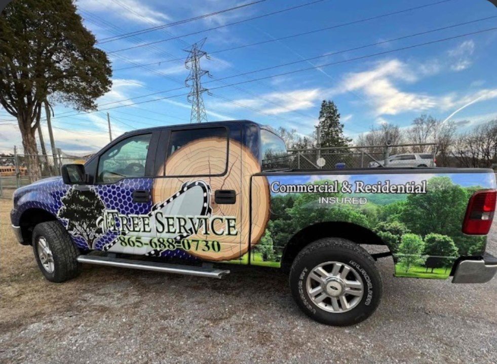 Wrapped Rodney Tree Service pickup truck